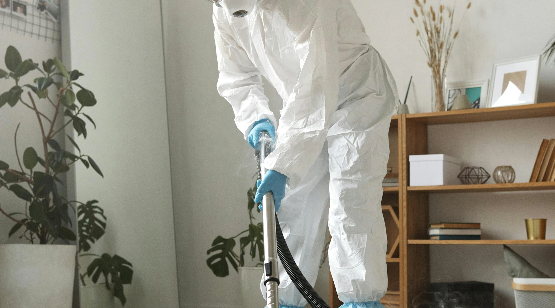 Carpet cleaning technician deep-cleaning a carpet