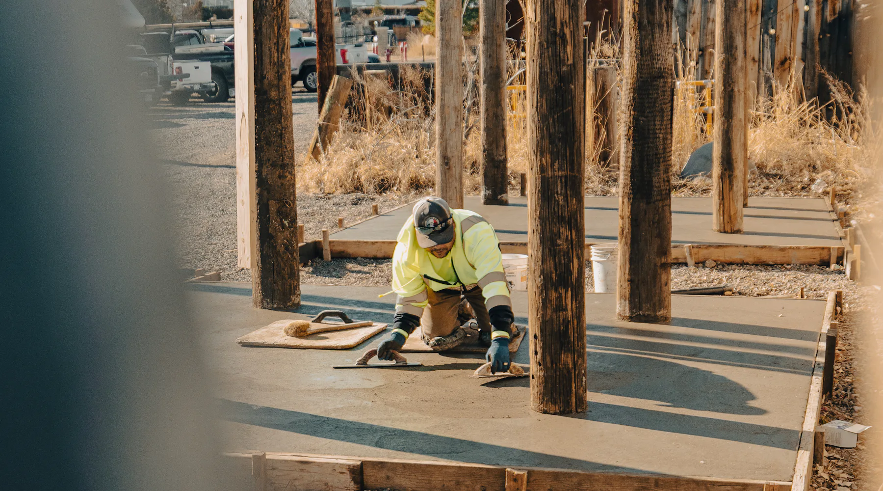 Finisher smoothing a freshly poured concrete slab