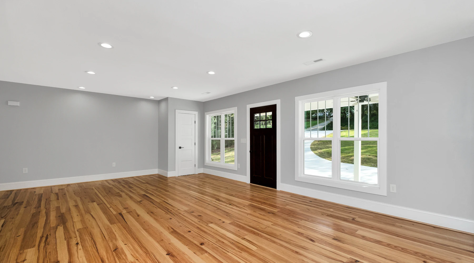 Room with a finished hardwood floor