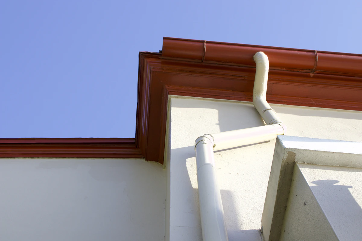 Gutter mounted along the side of a home